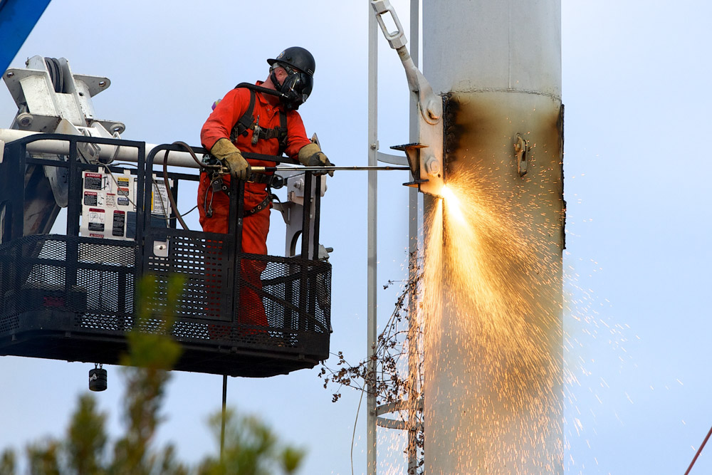 oxy-fuel cutting water tower demolition - Freeland Construction