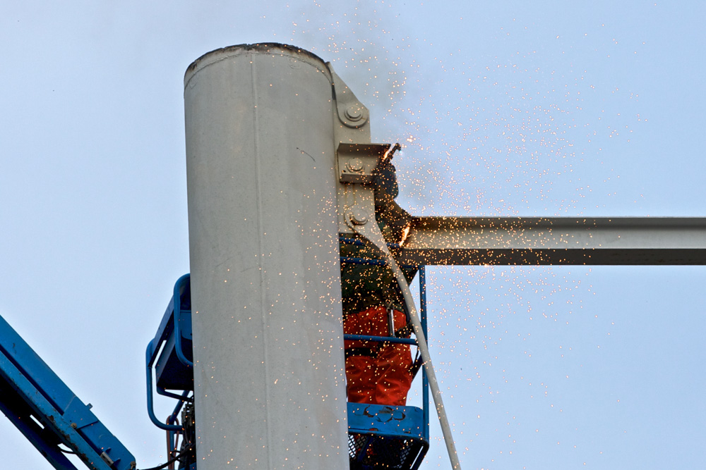 oxy-fuel cutting water tower demolition - Freeland Construction